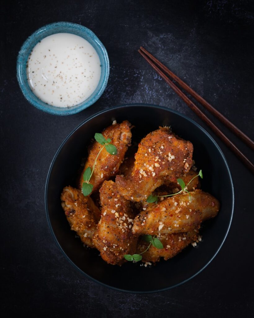 Fried Chicken in New Orleans on black frying pan